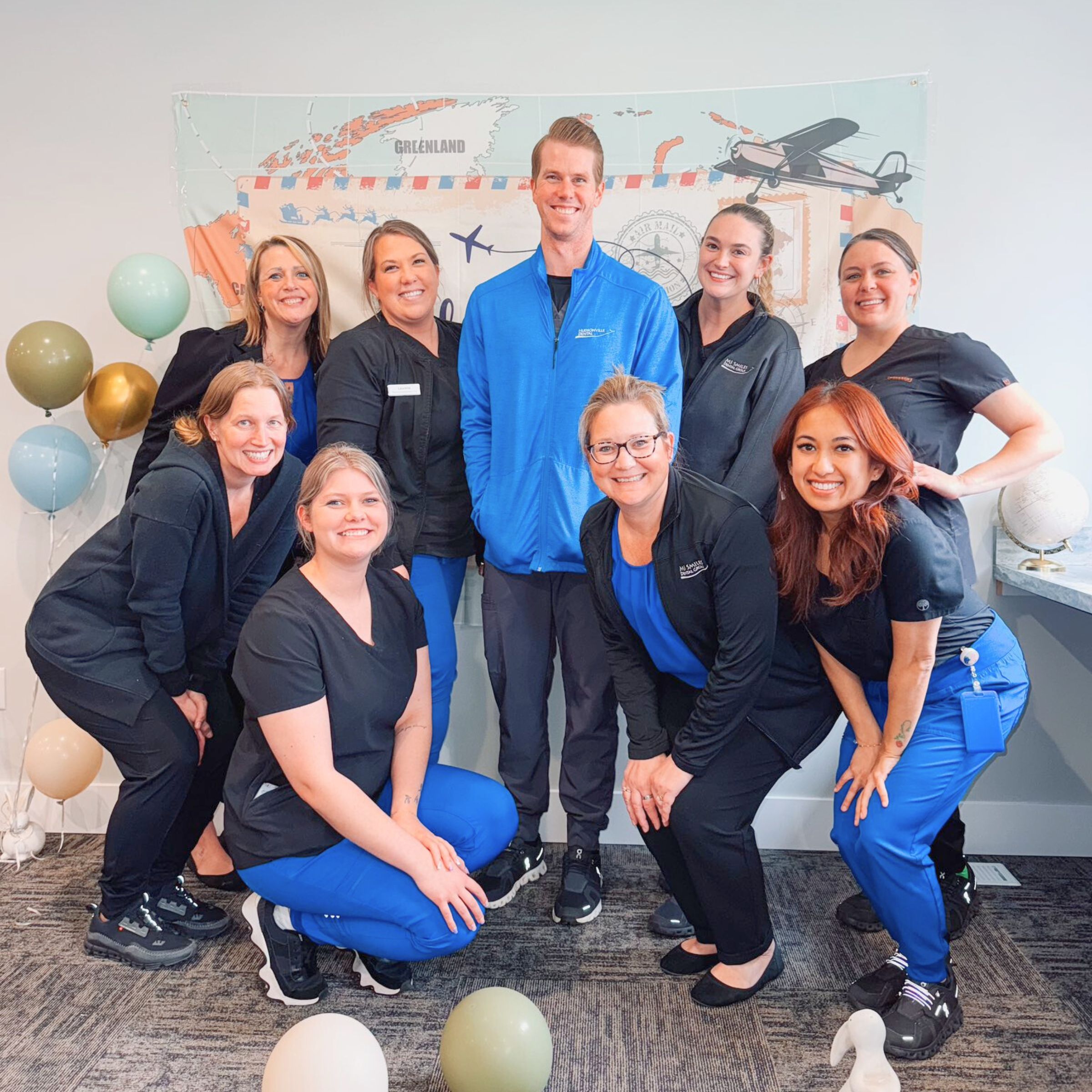 MI Smiles Dental Group team celebrating together at a baby shower