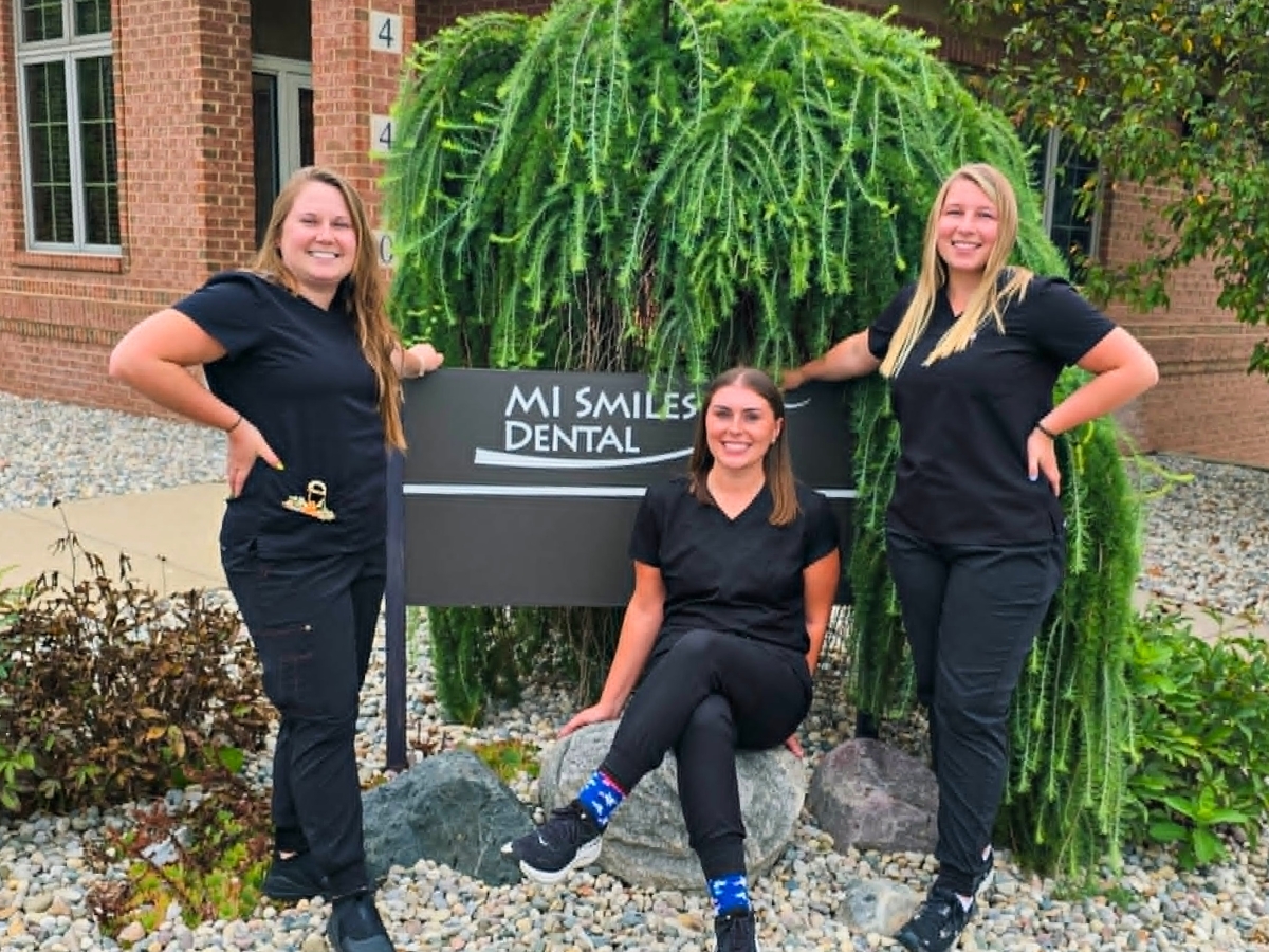 The hygiene team outside MI Smiles Dental Comstock Park